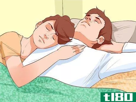 Image titled Avoid Trapping Your Arm While Snuggling in Bed Step 5