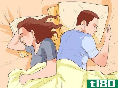 Image titled Avoid Trapping Your Arm While Snuggling in Bed Step 4