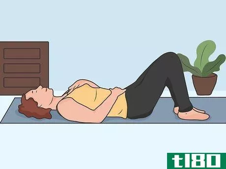 Image titled Stretch Your Lower Back While Lying Down Step 04