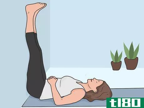 Image titled Stretch Your Lower Back While Lying Down Step 01