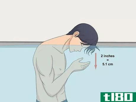 Image titled Swim Underwater Without Holding Your Nose Step 4