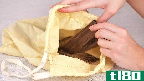 Image titled Store Clip in Hair Extensions Step 2