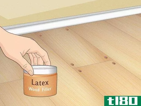 Image titled Fill Nail Holes in Hardwood Floors Step 1