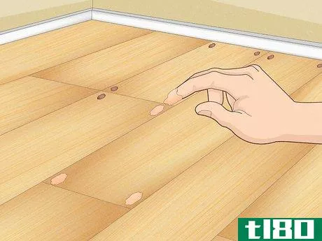 Image titled Fill Nail Holes in Hardwood Floors Step 9