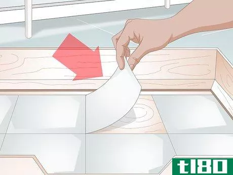Image titled Keep a Whelping Box Clean Step 1