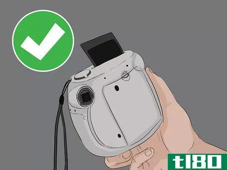 Image titled Use a Polaroid One Step Camera Step 2