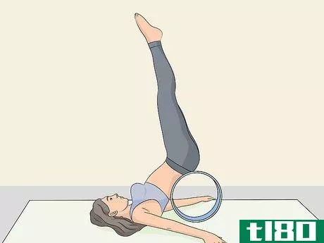 Image titled Use a Yoga Wheel Step 6