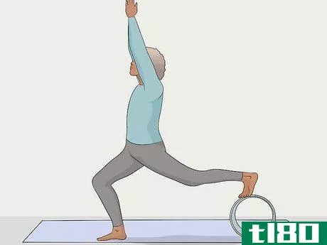 Image titled Use a Yoga Wheel Step 10