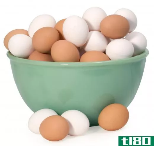 Brown and white chicken eggs.