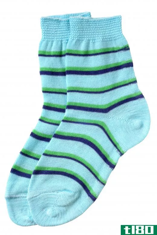 Wearing warm clothing and socks can help reduce the energy needed to heat a home.