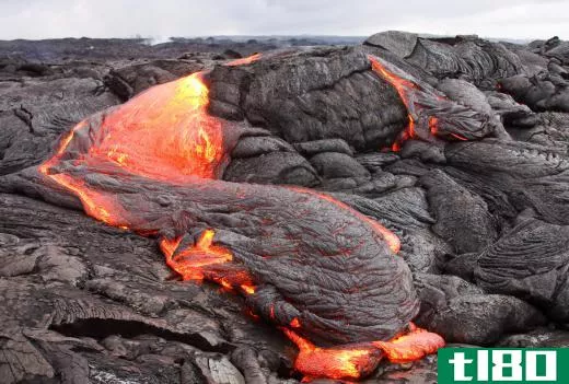 Lava flow occurs during a volcanic eruption.