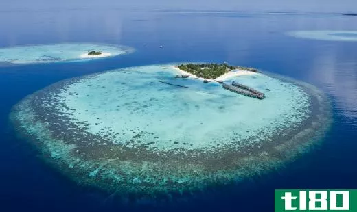 An atoll is a ring-shaped coral reef that surrounds a central lagoon.