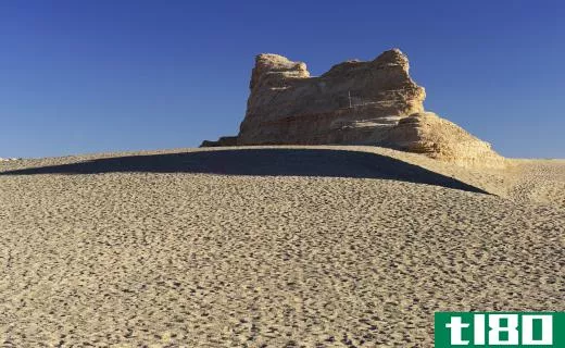Many yardangs, rock formations shaped by the wind, are made of sandstone.
