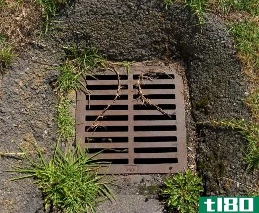 A drainage grate is a grate that covers the entrance to a ground level sewer line, which allows water to enter the sewer.