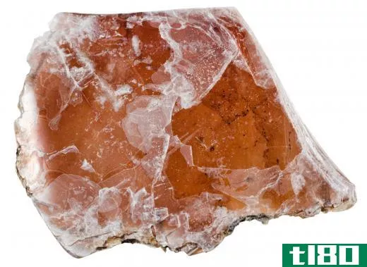 Mica, or isinglass, forms in thin transparent layers.