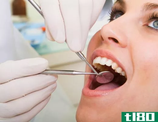 A dentist repairing a chipped tooth.