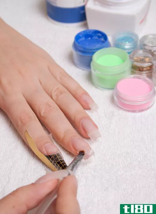 Priming the nails is done to help the acrylic adhere to the nail bed.