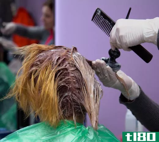 Double process hair coloring involves stripping the original color from the hair.