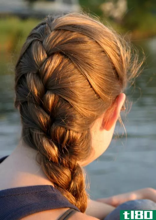 A woman with a French braid.