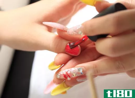 A cosmetologist may be skilled in applying nail art and artificial nails.