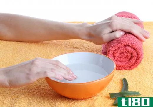 Soaking the fingers may help soften the cuticles so that they may be pushed back or clipped with ease.