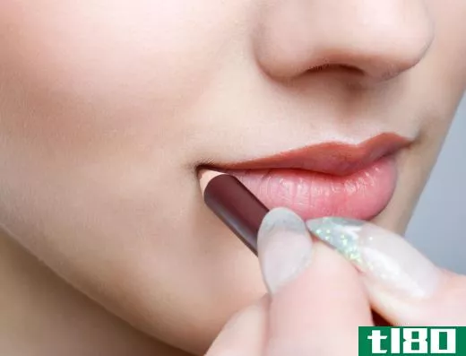 Lip liner should be applied over a base and underneath lipstick.