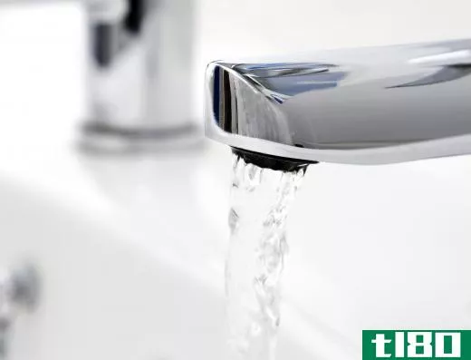 Rinsing a pair of glasses under warm water will aid in cleaning them.