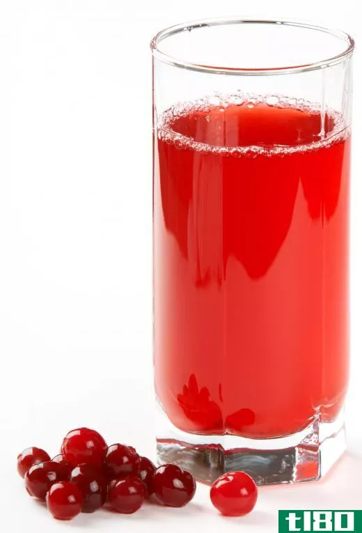 A glass of cranberry juice.