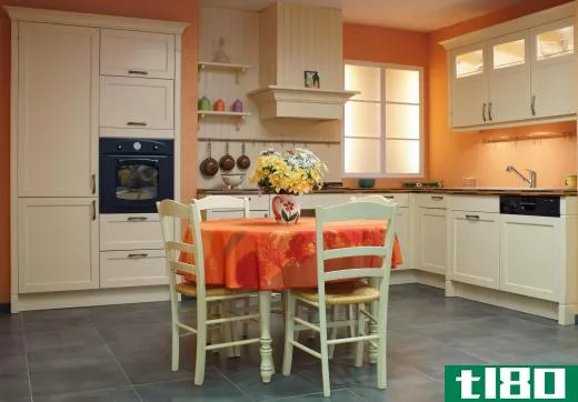 An eat-in kitchen has space to accommodate a kitchen table.