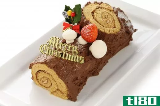 A Yule log is traditionally a rolled up sponge cake, filled with cream, and frosted to look like a log.