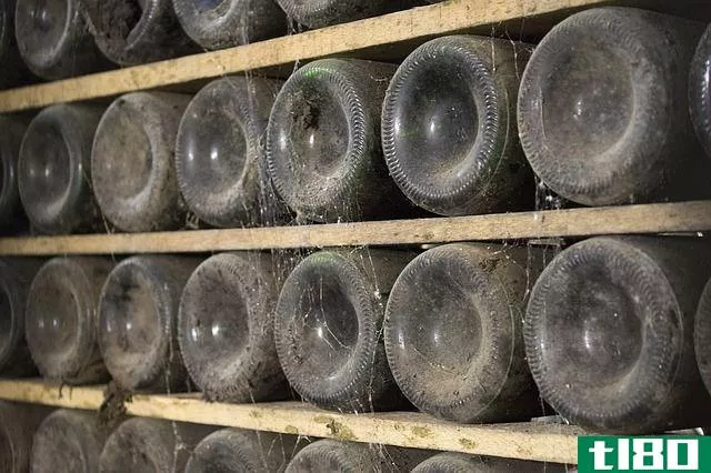 wine bottles on shelves