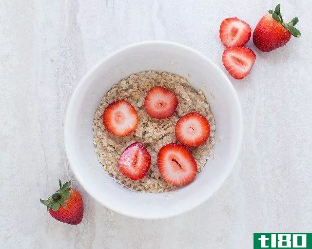 bowl of oatmeal and strawberries