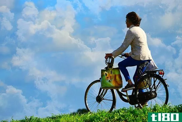 person riding a bike in a field