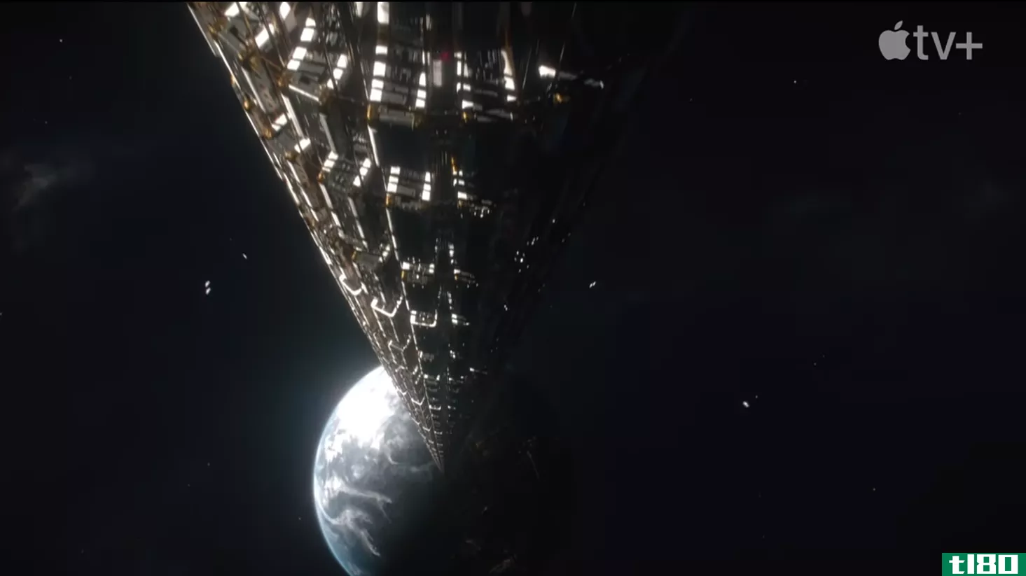A screenshot of a massive space elevator visible over Earth from Apple TV+'s FOUNDATION