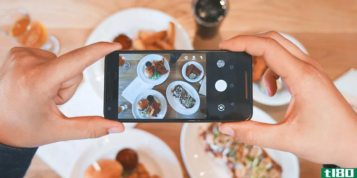 Someone taking a photo of food for Instagram