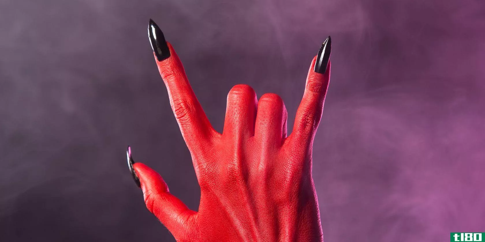 heavy-metal-gesture-red-devil-hand-with-black-nails-halloween