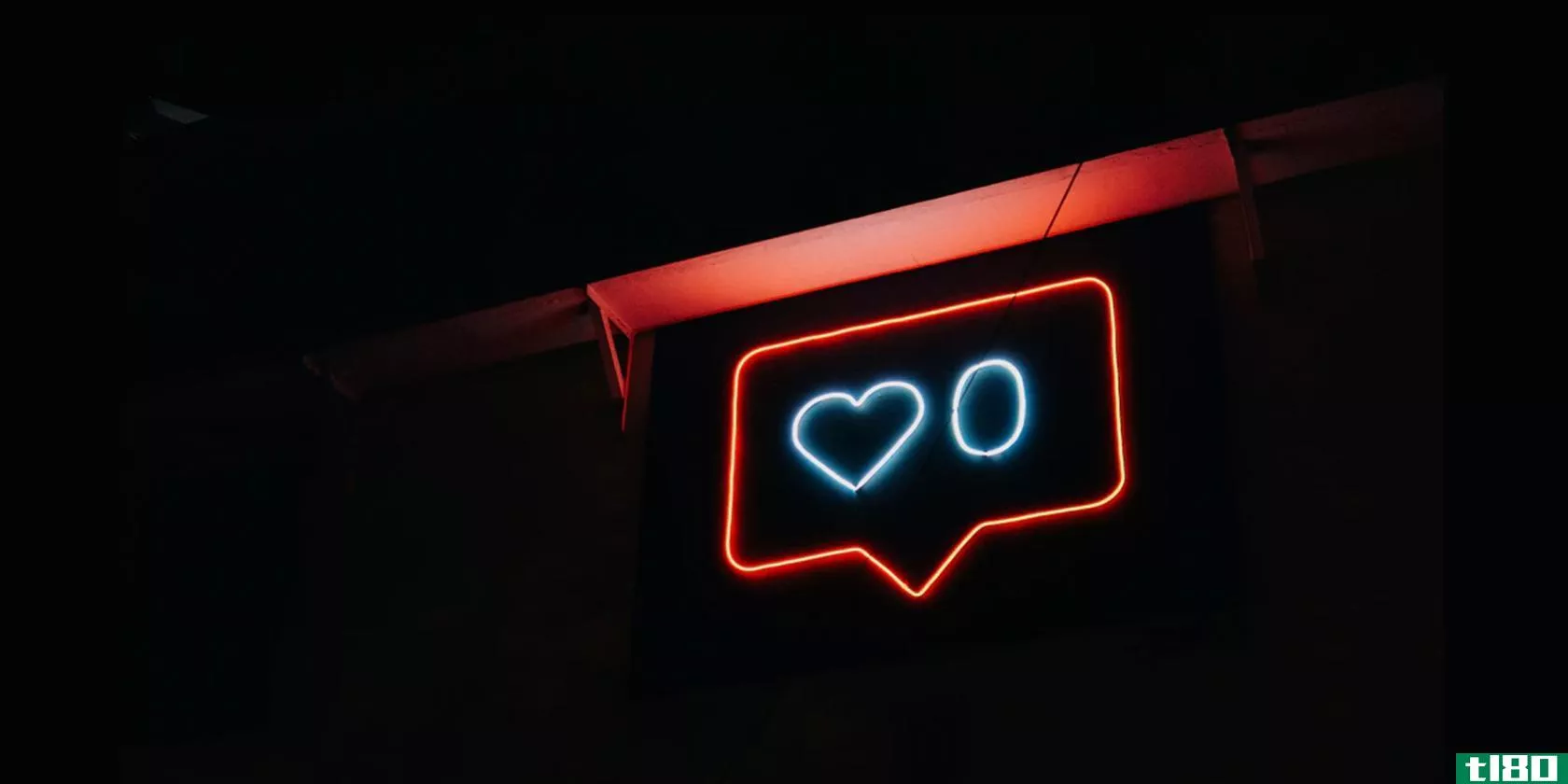 A neon sign of the Instagram like icon