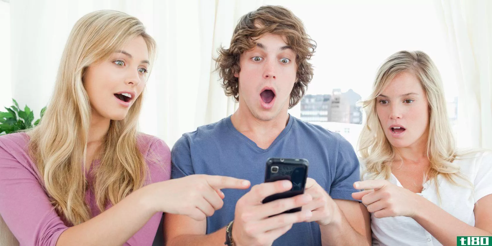 shocked-look-on-the-boy-and-his-friends-faces-as-they-read-the-text-message
