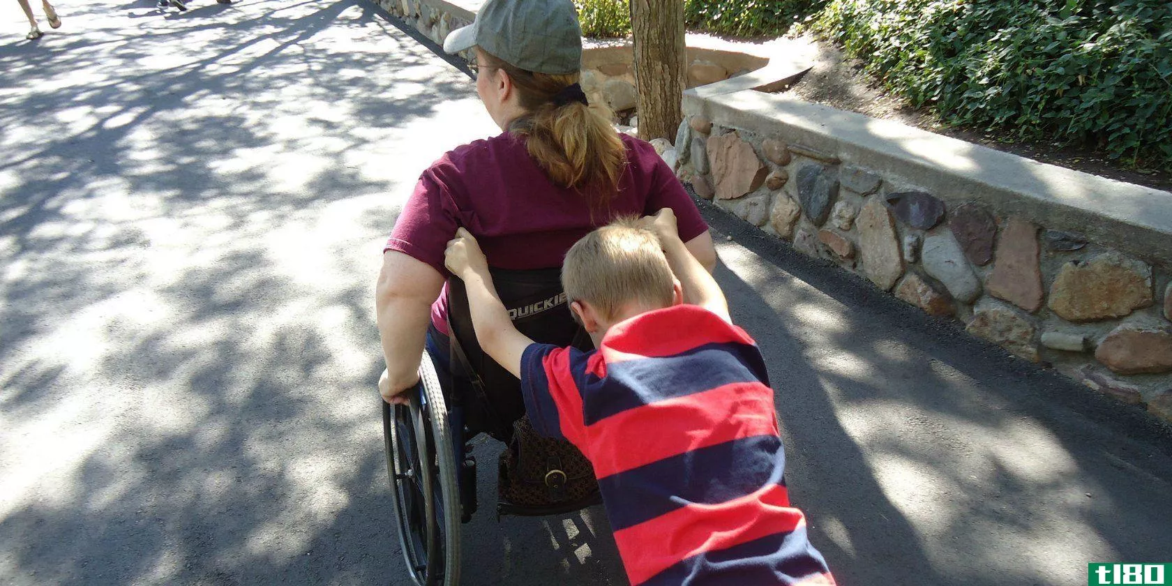 kid-pushing-wheelchair