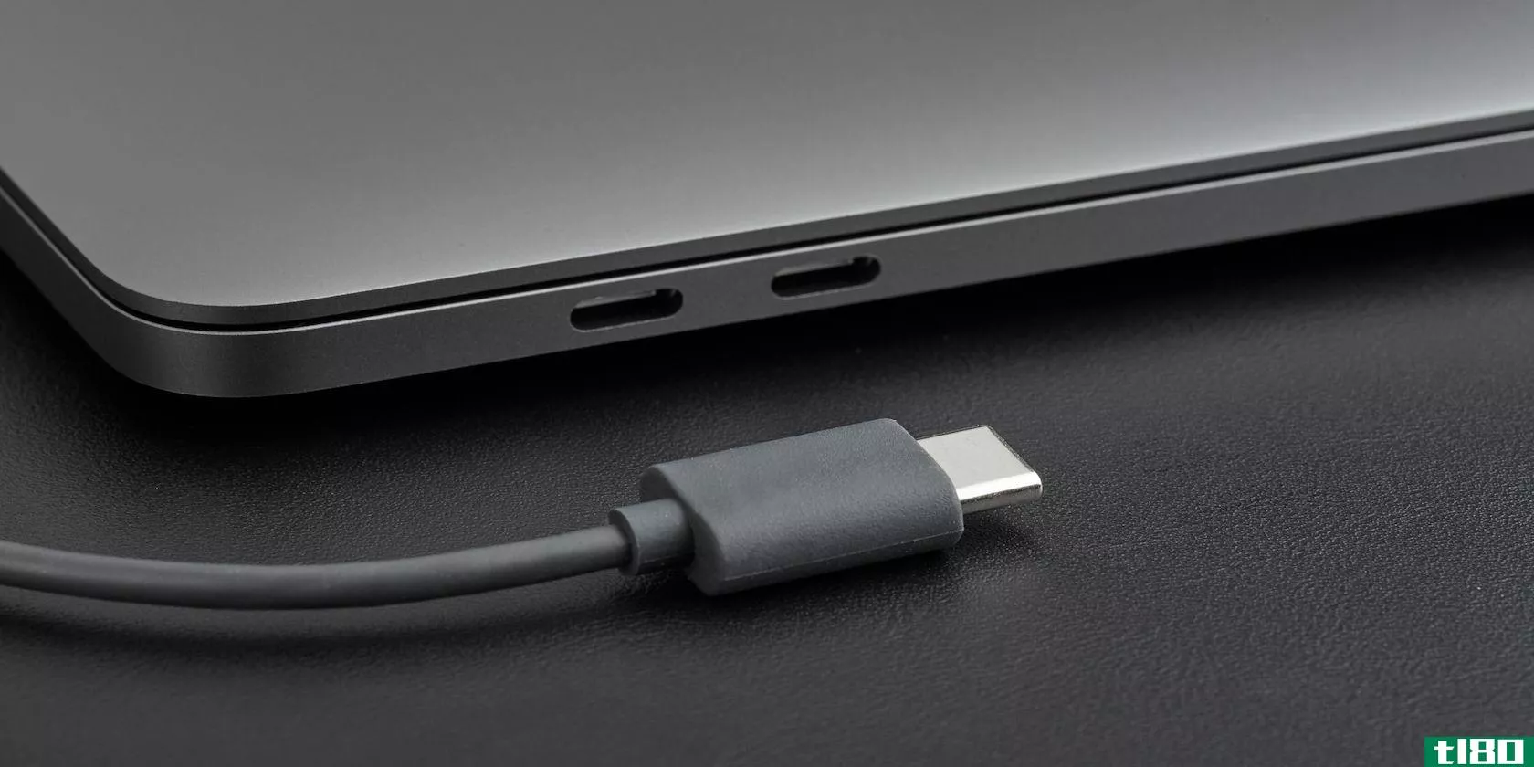 USB-C cable next to a laptop