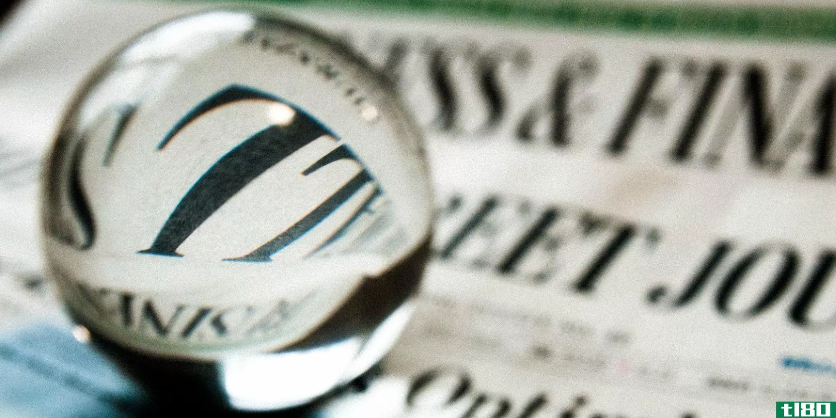 newspaper-magnifying-glass