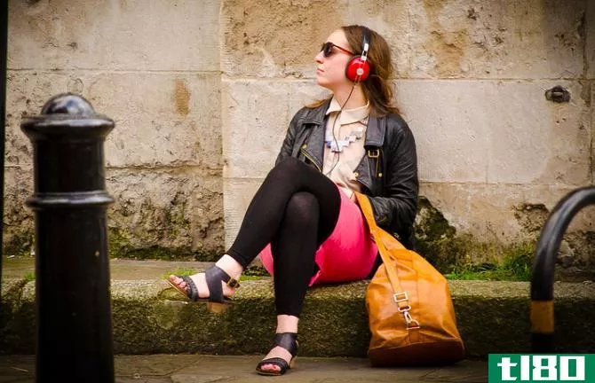 woman listening headphones