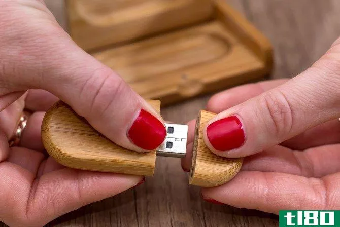 Wooden USB Opened With Hands