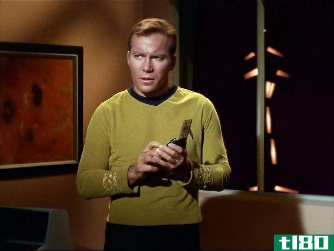 Captain James T Kirk With His Communicator