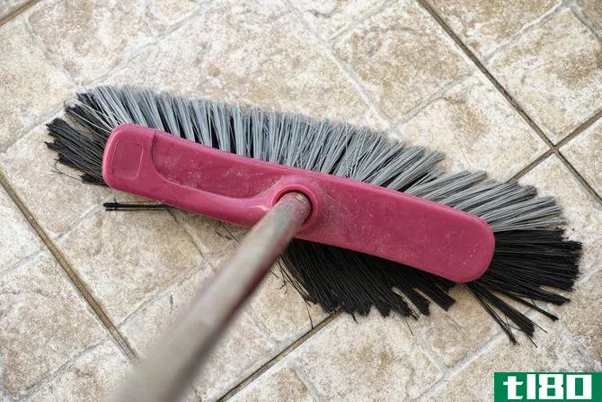 Broom Cleaning Stone Floor