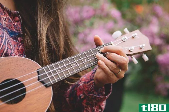 Woman Playing Ukelele