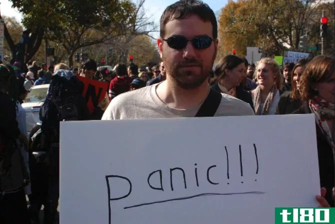 Man With a PANIC Sign