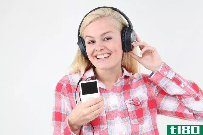 A woman listening to an iPod