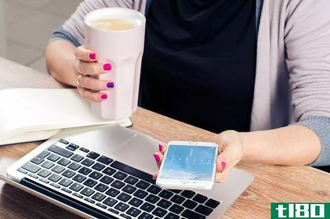 Woman Drinking Coffee on Phone and Mac
