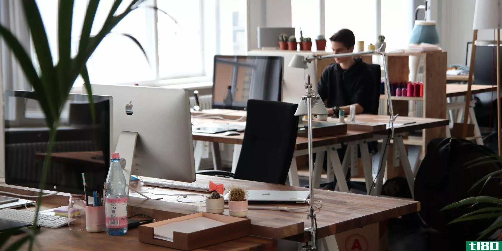 Office filled with iMac computers